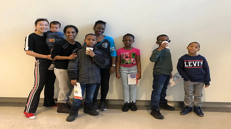 Harlem Wellness Center zumba instructor standing alongside participants of our January 2019 zumba class