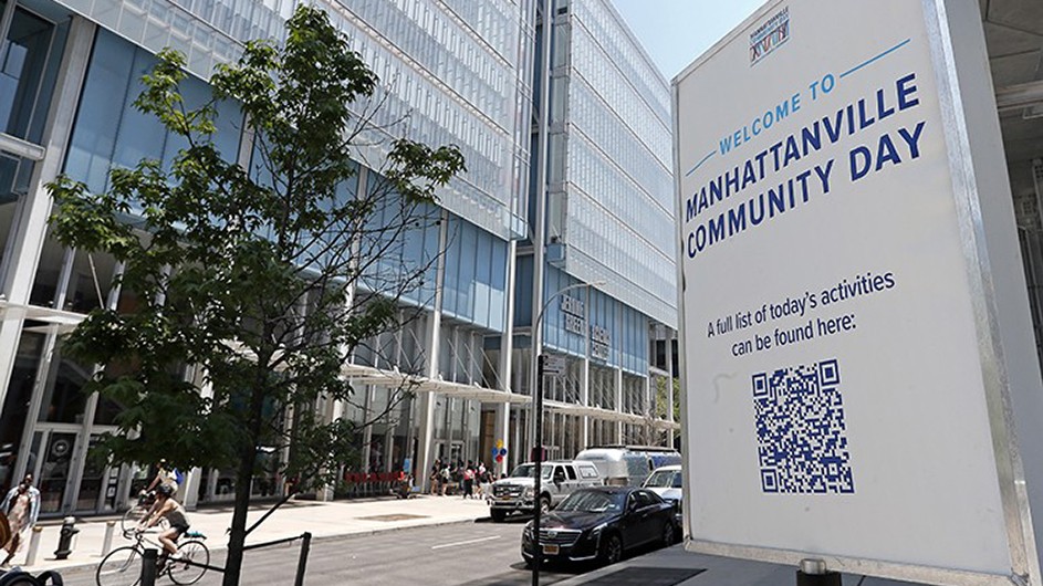 A sign reading "Welcome to Manhattanville Community Day" outside of Lenfest Center for the Arts on Columbia's Manhattanville campus.