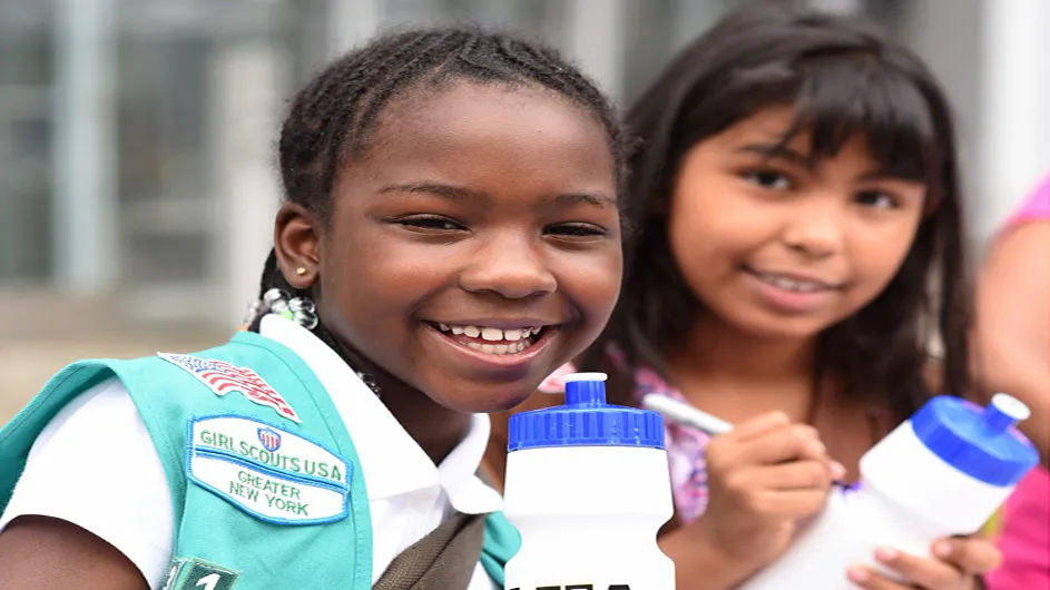 Two children hold their reusable water bottles during Manhattanville's Community Day on September 28th.